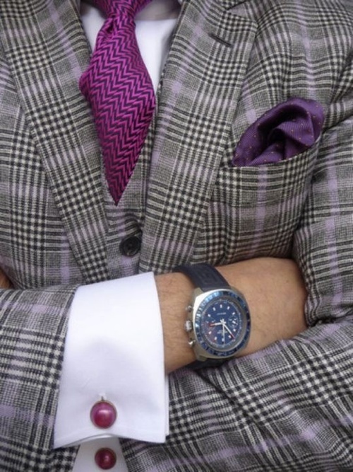 radiant orchid tie with purple pocket square and plaid grey jacket