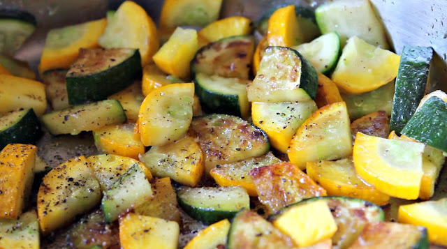 zucchini and yellow squash browning in skillet