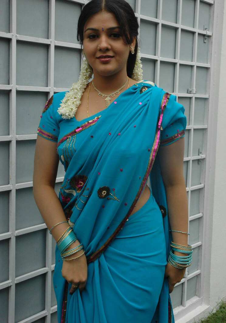 Lovely Pretty Jyothi Krishna in Blue Saree Navel shapes Photo Gallery. 
