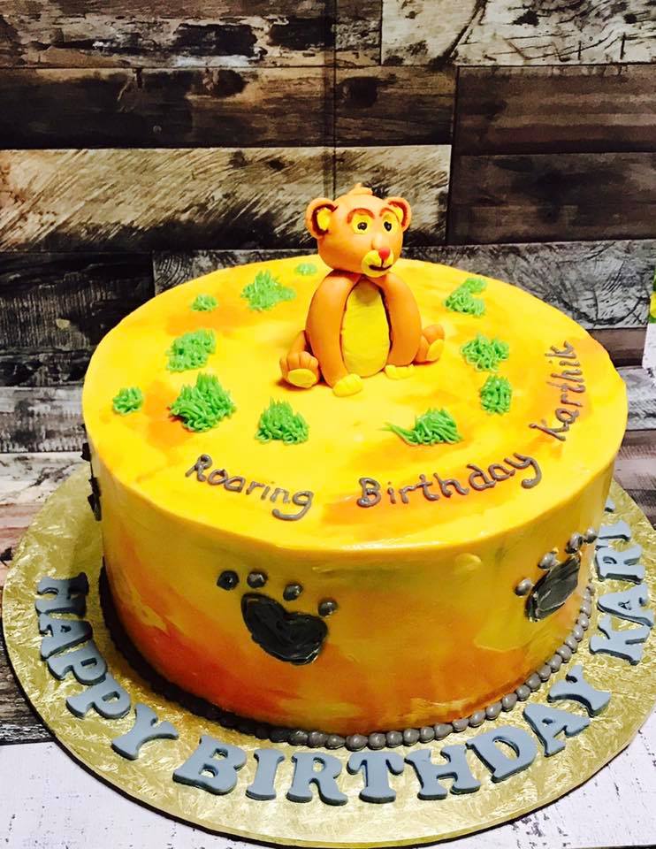Izah's Kitchen Baby cub themed cake, First Birthday themed Halal cake