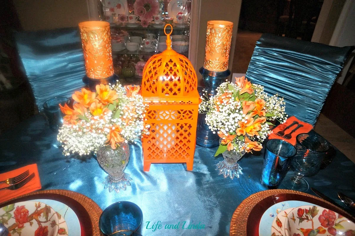 A Sea of Blue Green with Orange Table | Life and Linda