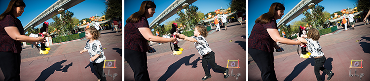Vivienne meets a little doll version of Minnie Mouse during her first visit to Disneyland.