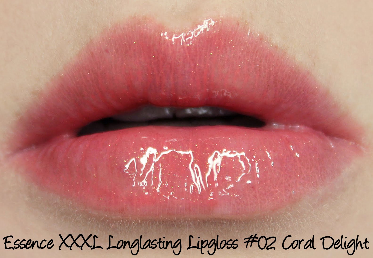 Essence XXXL Longlasting lipgloss #02 Coral Delight swatch