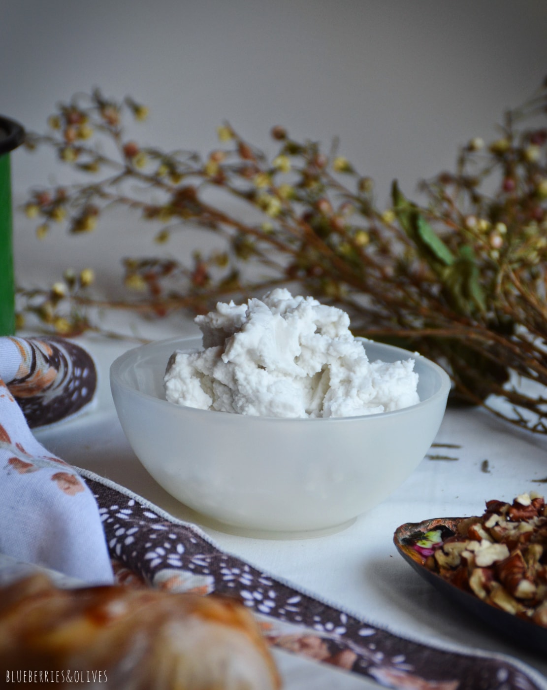 COCONUT WHIPPED CREAM IN SMALL BOWL FOR BANOFFEE ROLLS FILLING