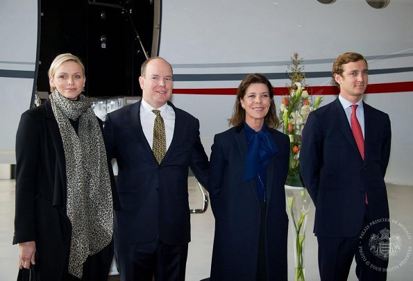 Princess Charlene Prince Albert II, Princess Caroliner and Pierre Casiraghi at presentation of the Monegasque Princely family's new plane