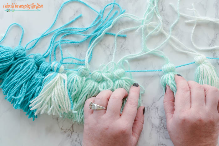 Ombre Tassel Garland | Cute garlands that are easy to create using a self-striping yarn. Fun and simple photo tutorial.