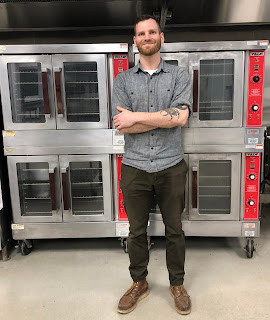 Ryan Evans inside Hatch Kitchen RVA