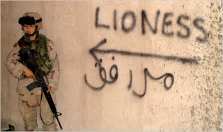 female soldier against beige wall with word lioness