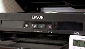 epson l210 blinking green light and ink and paper light