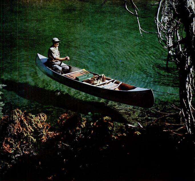 Paul Hosmer in floating canoe on Devil's Lake, Oregon 