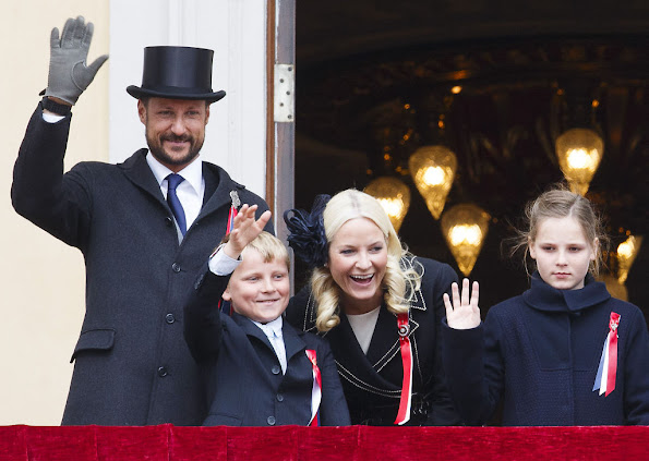 King Harald and Queen Sonja, Crown Prince Haakon of Norway and Crown Princess Mette-Marit of Norway with Princess Ingrid Alexandra, Prince Sverre Magnus and Marius Borg Høiby greet the Childrens Parade on the Skaugum Estate 
