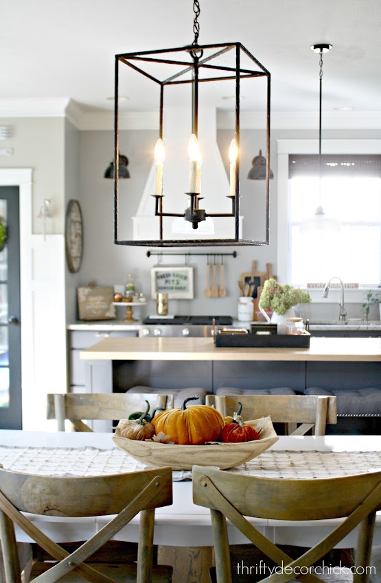 Rectangular light fixture over table