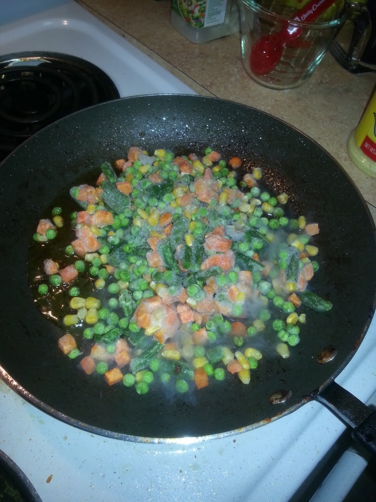 Pieces Of Joj0 Savory Seasoned Pork Chops On A Bed Of Rice