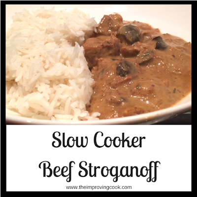 A white bowl of beef stroganoff with rice