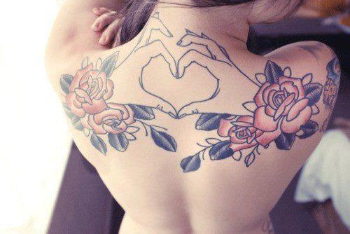 Simple hand heart tattoo with flower