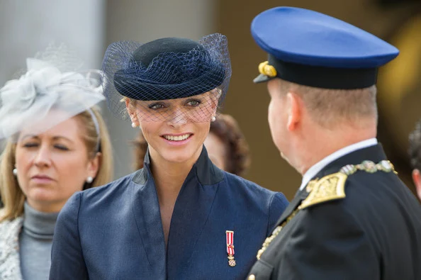 Prince Albert II of Monaco and Princess Charlene of Monaco attend the National Day Parade 2012. Charlotte Casiraghi