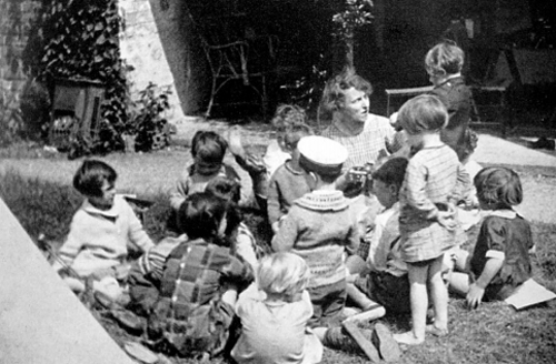 Susan Isaacs with children at The Malting House School