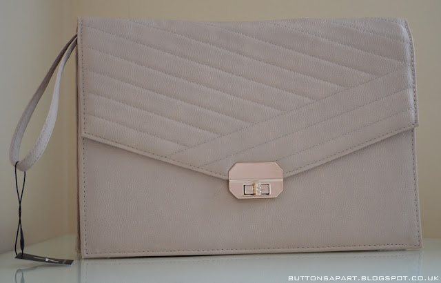 a picture of a blush clutch from primark 