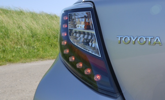 Rear lamp and Toyota badge of Yaris Hybrid