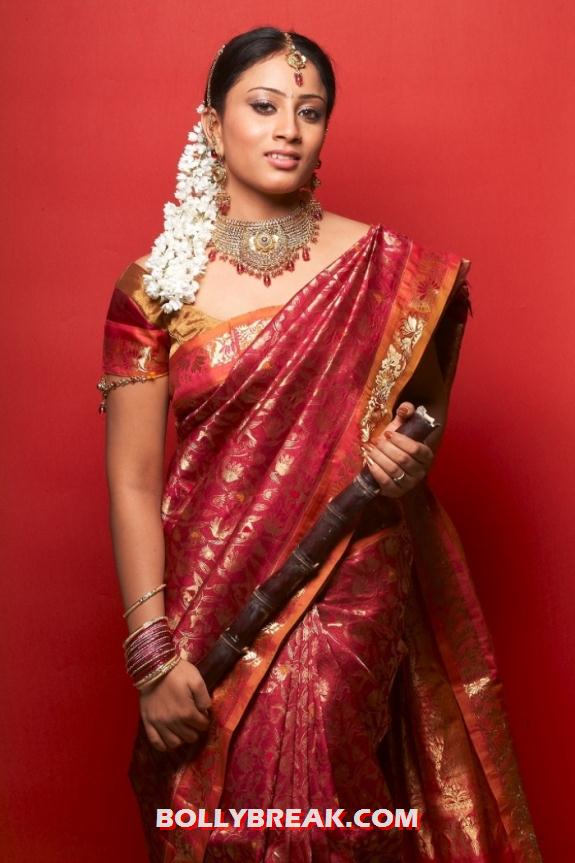 Hasini looking amazing in a traditional red silk saree - Hasini Latest Saree photo