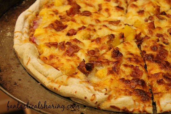 Bacon BBQ and Mango Pizza // Spicy barbecue sauce serves as a base for this bacon and mango pizza deliciousness #recipe #pizza #bacon #bbq #mango