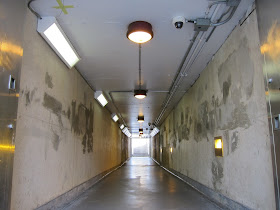 Pedestrian tunnel beneath the rail tracks at Lawrence East station