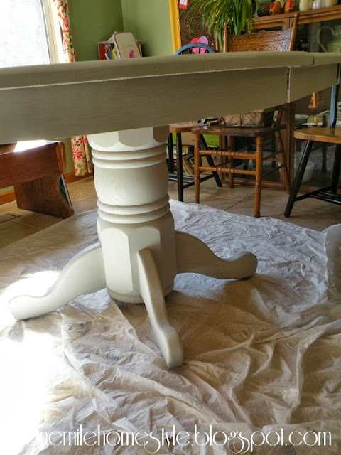 Dining table with second coat of paint, pedestal detail