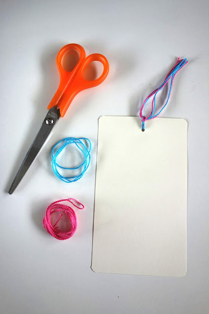 crafting tools, scissors, corner punch, one-hole punch, embroidery floss, watercolor