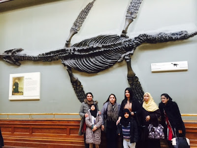 Science Museum Visit - standing in front of a fossil