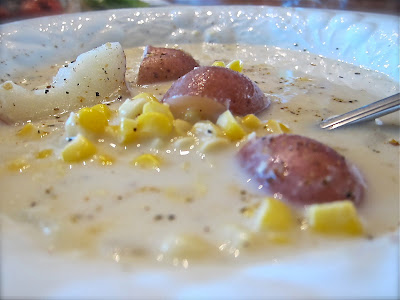 This corn and potato chowder is light and delicious; perfect for a summer day dinner. Made with corn cut fresh off the ears, it is full of delicious flavor.  #womenlivingwell #easyrecipe #soup #potato