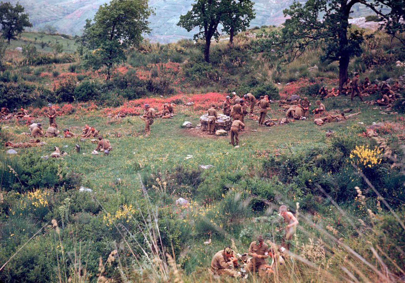 American troops rested in a field during the drive towards Rome, 1944.