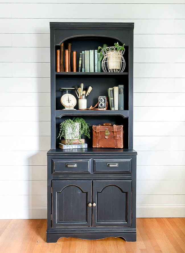 Painted and distressed black hutch makeover