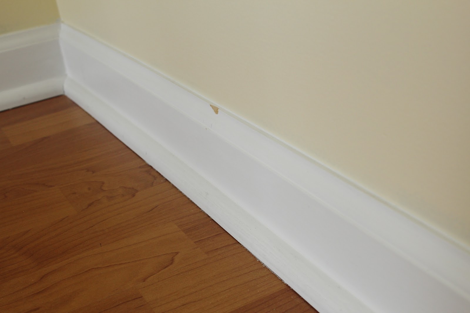 Nearly Handmade Spring Cleaning Touching Up Baseboards