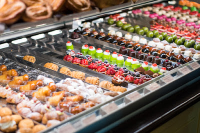 Delicious sweets behind the counter at Pasticceria Barberini in Rome Italy