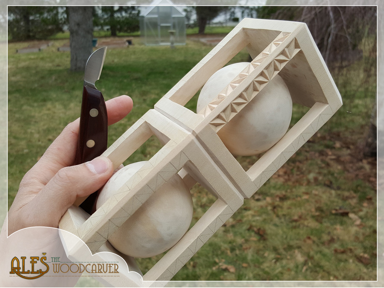 Ales the woodcarver Balls in a (chip carved) cage