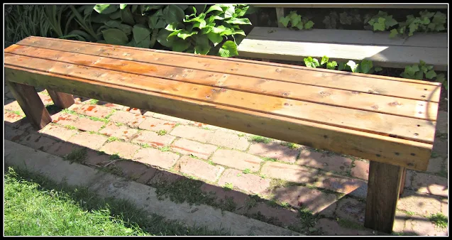 Garden bench with stain