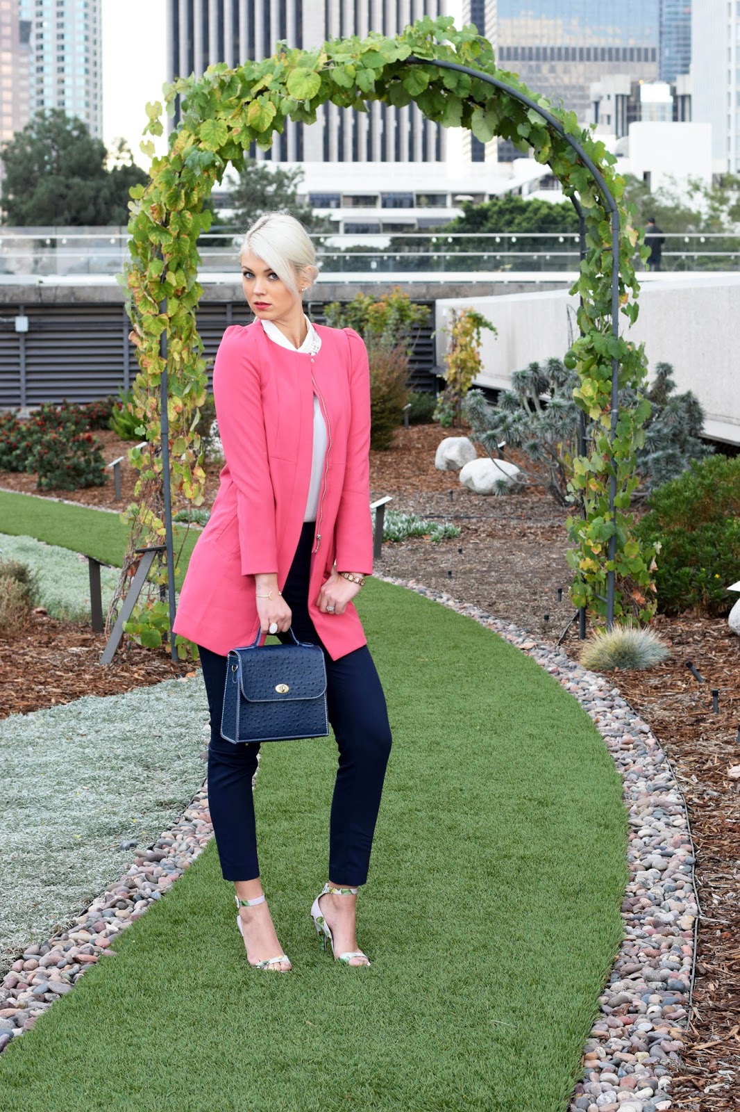 pink coat, ostrich purse, german blondy