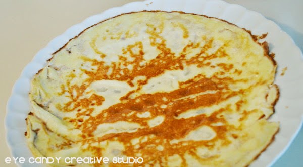 preparing crepes, lightly brown crepe in pan, how to make crepes