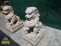 Patung foo dog dari batu alam paras jogja, batu putih