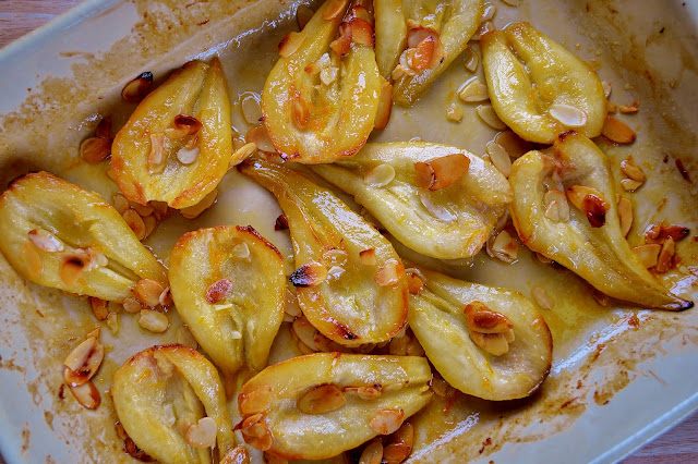 Caramelised Pears in a dish with toasted flaked almonds