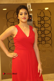 Actress Mouryani Stills in Red Dress at Intlo Deyyam Nakem Bhayam Trailer Launch  0017