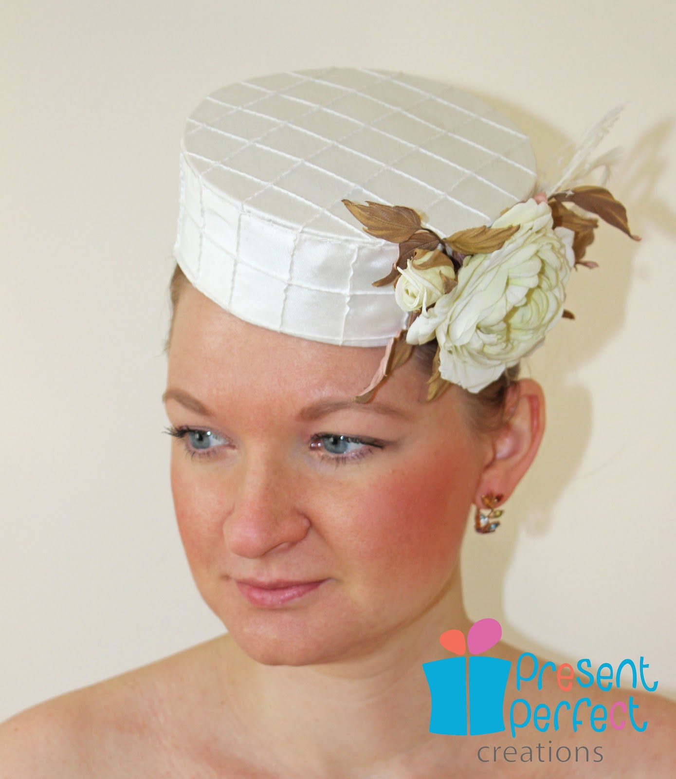 Present Perfect Creations A pillbox hat with silk roses