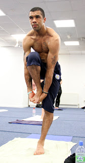 preparing to enter standing head-to-knee pose