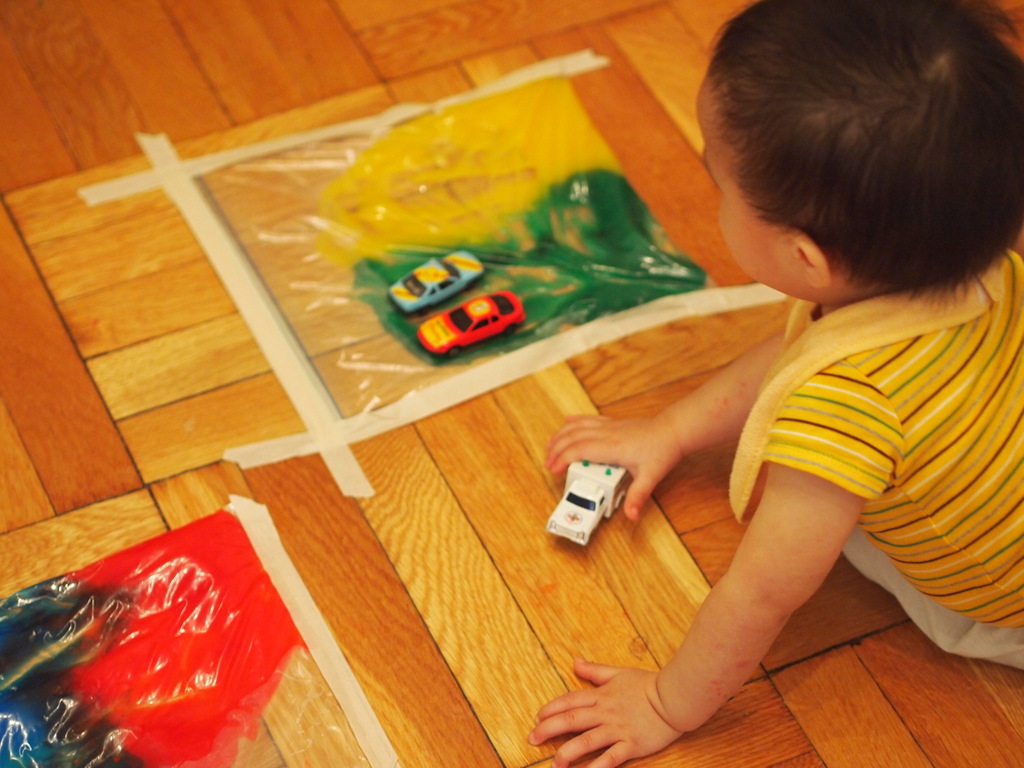 paint in ziplock bolsas taped to window