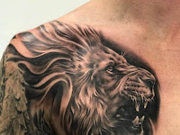 Men Lion Chest Piece Tattoo