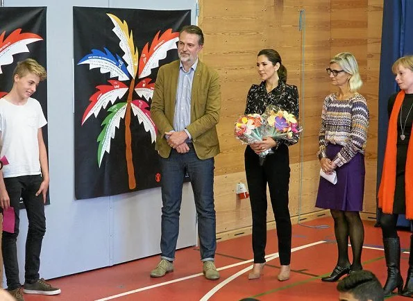 Crown Princess Mary wore a Isabel Marant blouse and Gianvito Rossi shoes. Red Barnet and Minister Ulla Tørnæs in Roskilde