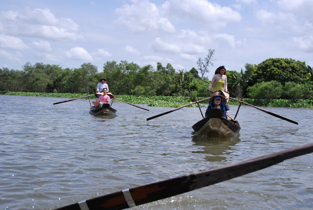 Le marché flottant Cai Be - un trait typique au Sud du Viet Nam