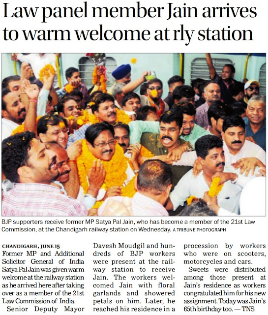 BJP supporters receive former MP Satya Pal Jain, who has become a member of the 21st Law Commission, at the Chandigarh railway station on Wednesday.