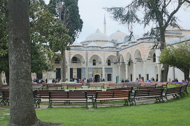 Enjoying the greenery and flowers at the well-maintained garden in Topkapi Palace in Istanbul, Turkey Enjoying the greenery and flowers at the well-maintained garden in Topkapi Palace in Istanbul, Turkey