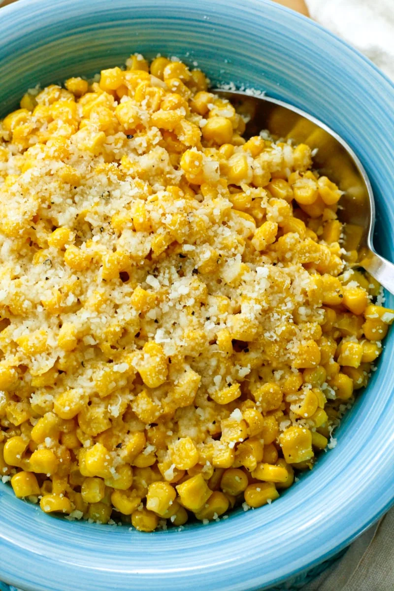 This Brown Butter Parmesan Corn recipe transforms canned corn into a holiday-worthy side dish in just minutes!  #corn #sidedish #brownbutter